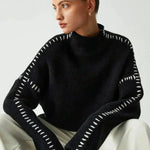 Nina ribstrikket sweater med høj hals fra Elsebeth København, set fra siden