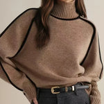 Sandrine rullekravesweater med kantdetalje fra Elsebeth København, styling med jeans