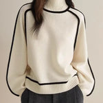 Sandrine rullekravesweater med kantdetalje fra Elsebeth København, set bagfra